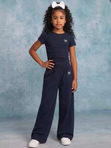 Emery Rose Kids Conjunto de camiseta con volantes y estampado de lazo para niñas preadolescentes - Azul Marino - Ver 3