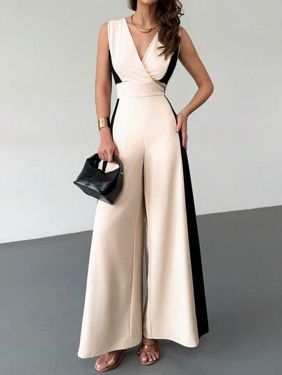 RiviMae 2026 New Spring/Summer Minimalist Commuter Outfit, Combining Elegant Professionalism And Fashionable Daily Wear. Sleeveless V-Neck Wrap Top With Contrasting Side Panel, High-Waisted Wide-Leg Jumpsuit In Beige Color, Featuring A Flowing, Sophisticated Silhouette.