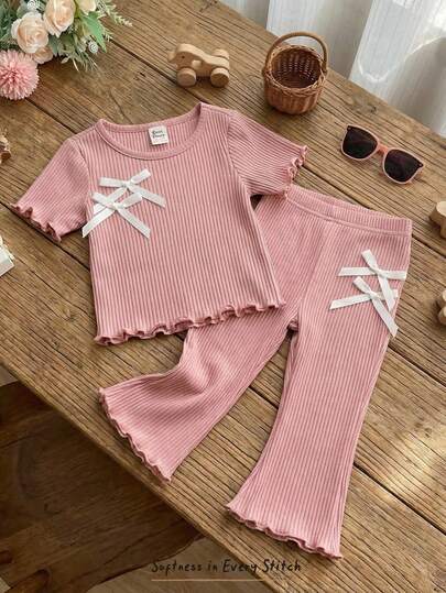 Cozy Pixies Babygirl Cute Summer Casual Knit Pink Ribbed White Bow Decor Short Sleeve Top And Elastic Waist Pants Set, Bow Decor Round Neck Pullover Top And Elastic Waist Pants 2pcs Outfit Toddler Girl Two Piece Set Pink Two Piece Set Girls Two Piece Set