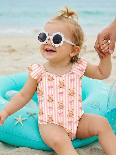 SHEIN Cream White & Cream Pink Striped, Cute Sweet BM Style Bow Teddy Bear Fairy Tale Print, Island Vacation, Baby Girl Spring/Summer Sweet Fashion Casual Adorable Flutter Sleeve One-Piece Swimsuit, Ruffle Sleeve One Piece Swimsuit, Vacation, Beach, Beachwear, Resort Style, Vacation Outfits