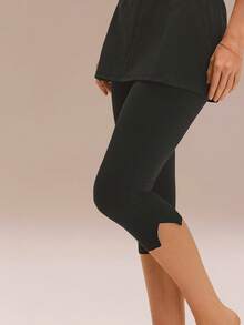 GLOWMODE 17英寸 FeatherFit™ A字型飘逸柔软弹力吸汗侧开衩中长裙式紧身裤，适合低强度瑜伽、普拉提、日常运动穿着 - 黑色 - 查看 6