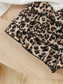 SHEIN 两件套女童樱桃豹纹蝴蝶结装饰圆领短袖上衣搭配层叠荷叶边豹纹短裤，时尚夏季休闲、运动、街头、度假、派对、海滩、购物、休闲等场合的理想之选。 - 彩色 - 查看 6