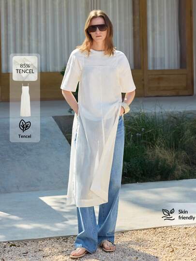 Ontre 这款女士轻盈舒适亲肤的高端莱赛尔纤维修身吊带背心，采用弹性腰带设计，侧边高开衩飘逸下摆，适合现代都市商务休闲、办公室穿着、通勤、高品质机场休闲、低调复古风、邮轮装扮、中东简约奢华风，是当季必备的百搭时尚单品。