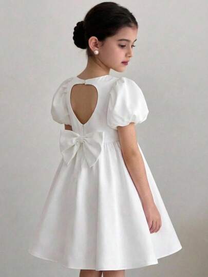 Pitira Tween Girls Partywear White Solid Satin Round Neck Puff Sleeve Waist Exposed Back Heart Shaped Bow Decor Sweet Cute Waist Dress, White Dress, Suitable For Flower Girl, Wedding Season, Valentine's Day, Party, Birthday, Chinese New Year