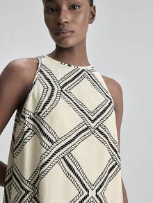 Ontre 2026新款春夏女装梭织面料套装，几何印花无袖上衣搭配阔腿裤，适合办公室、假日以及情人节、婚礼等场合穿着。 - 黑與白 - 查看 6