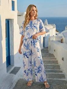 Faunlyn Bộ đồ nữ thanh lịch gồm áo sơ mi cổ chữ V xếp ly tay ngắn màu mơ và quần họa tiết hoa, trang phục đi nghỉ mát, trang phục ven biển, bộ đồ hai mảnh phong cách boho, trang phục mùa hè cho nữ, trang phục đi nghỉ mát, trang phục nghỉ lễ mùa hè, trang phục đi biển cho nữ, bộ đồ thường ngày cho nữ, bộ đồ hai mảnh họa tiết hoa cho nữ, quần áo đi nghỉ mát cho nữ, bộ quần ống rộng cho nữ, trang phục đi nghỉ mát. - Nhiều màu - Xem 6