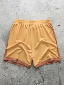 TEENAGE MUTANT NINJA TURTLES | SHEIN Quần short nam in chữ, cạp chun, kiểu dáng thường ngày đa năng. - Màu vàng - Xem 2