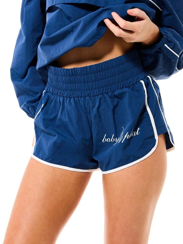 BABYPHAT Women's Blue Nylon Runner Athletic Shorts With White Trim And Script Branding For Active Summer Wear