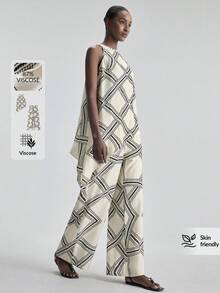 Ontre 2026新款春夏女装梭织面料套装，几何印花无袖上衣搭配阔腿裤，适合办公室、假日以及情人节、婚礼等场合穿着。 - 黑與白 - 查看 1