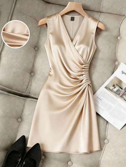 Franclia Elegant Champagne-Colored Satin A-Line Sleeveless Mini Dress With A Crossover V-Neck, Cinched Waist, And Tie-Waist Design. Suitable For Summer, Spring, Easter, St. Patrick's Day, Party, Wedding, And Graduation Occasions. Features Include A Champagne-Colored Satin Fabric, A Shimmering Design, A Crossover Neckline, Side Ruching, A Fitted Waist, And A Sleeveless, Short Silhouette.