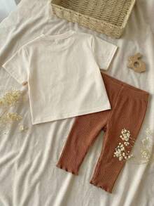 Cozy Pixies Ensemble 2 pièces pour nouveau-né fille : Top à manches courtes col rond en tricot avec nœud et pantalon à taille élastique - Multicolore - Voir 3