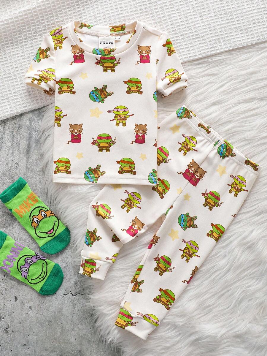 TEENAGE MUTANT NINJA TURTLES | SHEIN Bộ đồ ngủ ngắn tay và quần legging hình Rùa đột biến cho bé trai - trắng - Xem 1