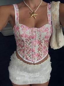 Aloruh 这位女士身穿优雅的红色蕾丝文胸，搭配罩杯式上衣和紧身连衣裙，胸部采用褶皱设计，肩带系成蝴蝶结，适合音乐会、乡村音乐会、夜总会和性感派对等场合。性感优雅的派对上衣。花朵上衣、夏季上衣、束身胸衣、玫瑰上衣、Y2K风格女士束身胸衣、女士束身胸衣、花朵束身胸衣、夏季束身胸衣、可爱束身胸衣、刺绣束身胸衣、束身衣套装 - 彩色 - 查看 2