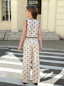 SHEIN Serisse Kids 少女蝴蝶印花撞色滚边蝴蝶结装饰无袖上衣和阔腿裤两件套 - 杏色 - 查看 9