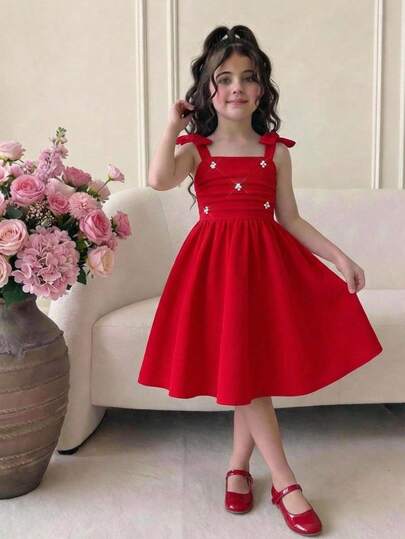 SHEIN Vestido rojo de verano/primavera casual y elegante con tirantes finos, lazo decorativo y volantes fruncidos con cuentas para niñas preadolescentes