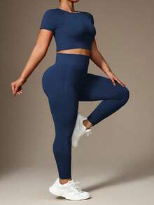Rhythm Era Bộ đồ thể thao nữ cỡ lớn, màu trơn, tay ngắn, dáng lửng gồm áo thun và quần legging. - Màu xanh hải quân - Xem 3