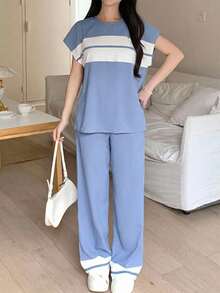 SHEIN Bộ đồ hai mảnh cho bé gái tuổi teen, gồm áo thun ngắn tay cổ trễ vai phối màu, chất liệu dệt kim, có dây buộc và nơ, thích hợp cho mùa tựu trường/Ngày lễ tình nhân/Mùa hè. - Màu xanh nhạt - Xem 6