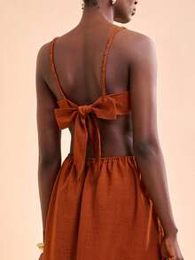 Zivah Bộ sưu tập Xuân/Hè 2026 mới về, thích hợp cho các dịp lễ hội âm nhạc, Lễ Phục Sinh, Ngày Thánh Patrick, Ngày Valentine, Hẹn hò, Phong cách miền Tây, Phong cách du mục, Tiệc sinh nhật, Lễ tốt nghiệp, Đại học, Sinh viên, Thường ngày, Đa năng, Giải trí, Du lịch tàu biển, Bãi biển, Tắm nắng, Phong cách thịnh hành, Thời trang đường phố, Khách dự đám cưới, Phong cách Boho, Đi làm, Ăn sáng muộn, Sân bay, Tiệc tùng, Đi chơi ngày lễ, Trang phục công sở. Đầm linen hai dây có thể điều chỉnh với thiết kế buộc dây màu nâu. - màu nâu - Xem 2