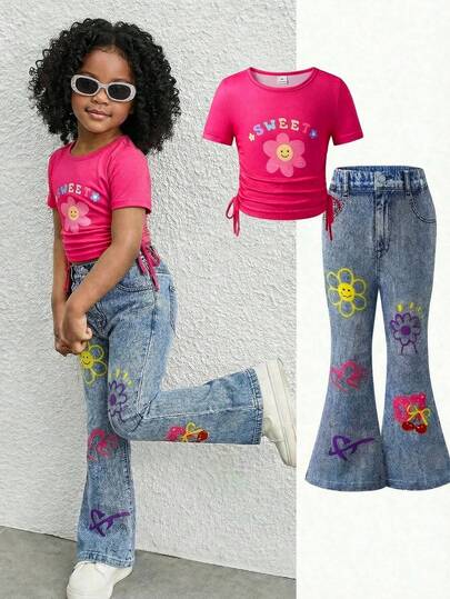 SHEIN Set de 2 piezas para niñas pequeñas: Blusa de manga corta con cuello redondo y estampado floral en la cintura, y pantalones largos con efecto de estampado de girasol