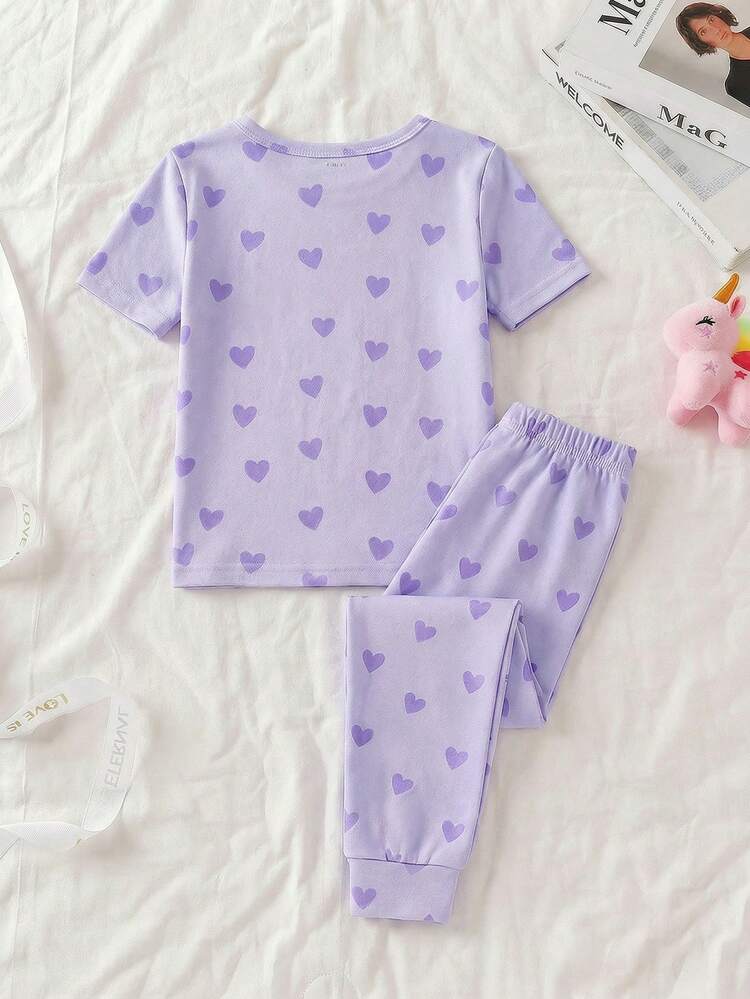 Set de 2 piezas de pijama para niñas pequeñas con estampado de dibujos animados, morado claro que brilla en la oscuridad, moda de grupo de chicas K-pop, estampado de corazón y niña de dibujos animados, tela de punto elástica, cómoda parte superior de manga corta y pantalones, conjunto de ropa de dormir de 2 piezas - Morado - Añade 2