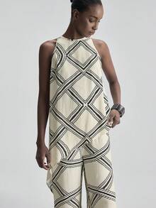 Ontre 2026新款春夏女装梭织面料套装，几何印花无袖上衣搭配阔腿裤，适合办公室、假日以及情人节、婚礼等场合穿着。 - 黑與白 - 查看 4