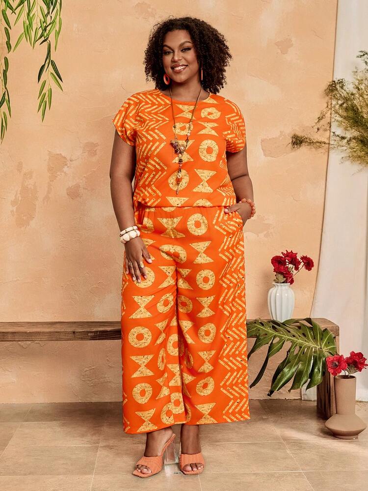 Plus Size Women Summer Orange Abstract Pattern Cap Sleeve Vibrant Geometric Print Top And Palazzo Pants Set Two Piece Outfit Summer Outfit For Plus Size Women Festival Outfits For Plus Size Women Beach Outfits For Plus Size Women Vacation Outfits Plus Size  Women Country Concert Outfit  Boho Outfit