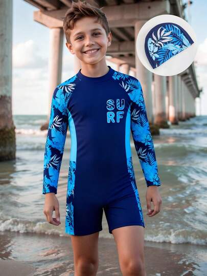 SHEIN Traje de baño para niños preadolescentes, bañador de una pieza con cierre y gorro de natación, de tela de punto con estampado tropical azul, traje de baño informal para niños preadolescentes adecuado para nadar, vacaciones de verano, playa, piscina, fiesta de vacaciones