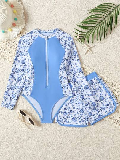 SHEIN 少女新款时尚拼接印花泳衣套装，热带植物印花比基尼泳衣，带防晒衣的长袖泳衣，适合少女穿着。儿童防晒衣两件套泳衣，长袖和短裤带拉链，适合青少年女孩。长袖泳衣套装，带防晒衣的泳裤，儿童泳衣，长袖少女保守泳衣，适合女孩度假穿着的长袖泳衣带短裤。