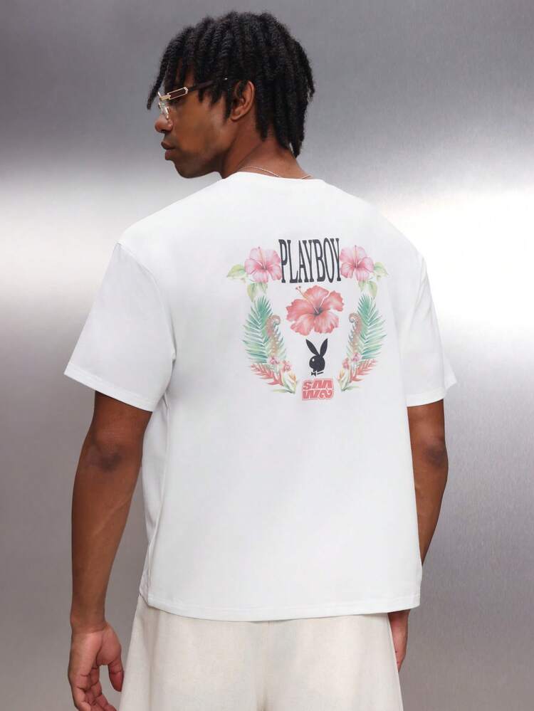 PLAYBOY X SUMWON Men's Regular Fit Tropical Holiday Crew Neck Short Sleeve Graphic T-Shirt With Hibiscus Floral Print And Logo