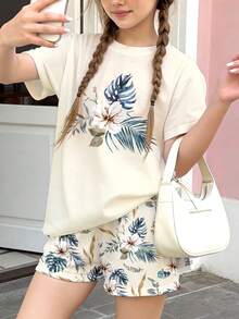 两件套少女休闲热带花卉印花短袖圆领T恤和短裤套装，适合春夏日常、居家、上学穿着，复古花卉图案，春夏时尚，休闲别致，轻松休闲风，轻盈舒适。 - 彩色 - 查看 4