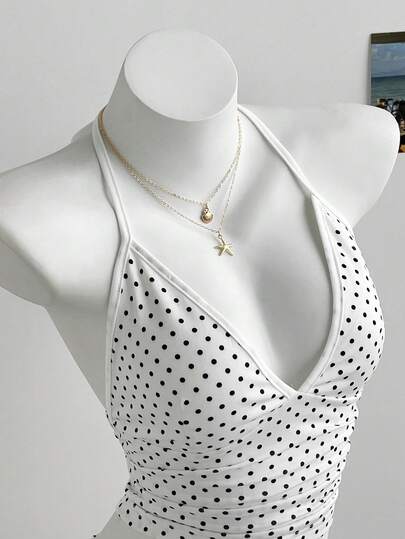 Elamini Bộ đồ nữ phong cách tối giản, áo hai dây chấm bi và chân váy ngắn.