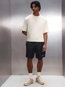 PLAYBOY X SUMWON Camiseta de cuello redondo de manga corta oversize de hombre en color crema, de uso casual y urbano, de mezcla de algodón, con ajuste relajado, para uso diario en verano y primavera - Albaricoque - Ver 3