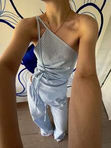 Siren Gaze Bộ đồ nữ phong cách nghỉ dưỡng thường ngày, họa tiết kẻ sọc, áo crop top buộc dây phía trước hở lưng và quần ống rộng, gồm 2 món, thích hợp cho mùa xuân/hè/thu. Bộ đồ ngủ nữ mùa hè thường ngày màu hồng, gồm áo không tay cổ tròn kẻ sọc và quần ống đứng thoải mái kẻ sọc, phù hợp mặc hàng ngày, thể thao, thu/đông, quần áo ấm áp mùa thu và mùa đông cho nữ. Bộ đồ nữ thời trang thường ngày kẻ sọc gồm 2 món: áo thun rộng vai rớt kẻ sọc và quần cạp chun kẻ sọc, bộ đồ len mùa đông, thu/đông, quần áo ấm áp mùa thu và mùa đông cho nữ. Bộ đồ màu xanh dương phong cách Y2K hở lưng cạp thấp ống rộng dáng suông màu xanh dương, thích hợp cho mùa xuân/hè. - Xanh và trắng - Xem 10