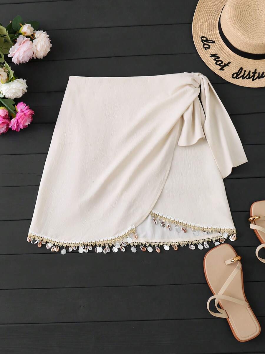 GlowEve CURVE Plus Size Women's Summer Casual Beach Holiday Shell Tassel Patchwork Asymmetrical Hem Tie-Up Textured Short Skirt, Apricot - Apricot - View 1