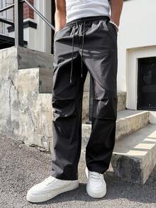 SLATEMANN 男士街头风降落伞灵感工装裤，宽松街头嘻哈风阔腿直筒休闲裤，男士户外街头风。适合男士复古风格、日常休闲、周末旅行、户外活动、探险旅行、轻松的工作环境或半正式场合，可作为男友/丈夫礼物、周年纪念/生日礼物、派对、夏季假期、婚礼、春夏、狂欢节等场合穿着。男士科技风长裤，黑色男士工装裤，实用裤，街头风长裤，尼龙科技风长裤。 - 黑色 - 查看 4
