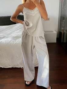 DAZY Bộ đồ ngủ 2 món gồm áo hai dây không tay phối ren và quần dài ống rộng dáng suông dành cho nữ, thích hợp cho mùa hè. - Màu Xám nhạt - Xem 7