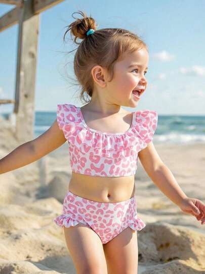 Bộ bikini 2 mảnh thời trang mới cho bé gái, họa tiết da báo, che phủ toàn thân và có bèo nhún.