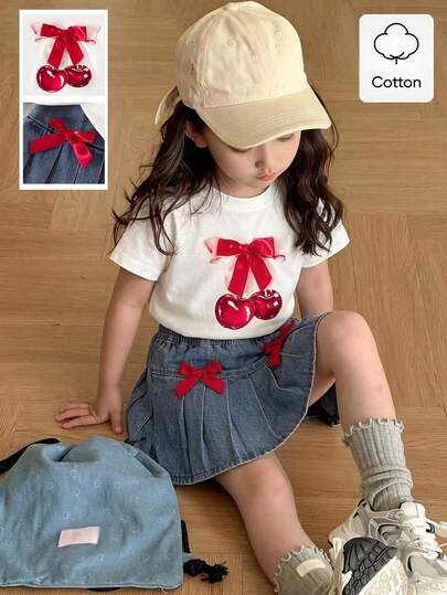 Elladie kids Conjunto de camiseta y falda vaquera de niña para primavera/verano, con camiseta de manga corta blanca con estampado de cereza y lazo, y falda vaquera plisada con lazo 3D de color burdeos, estilo casual, elegante y dulce, adecuado para uso diario, escuela, salidas y primavera/verano, 2 piezas