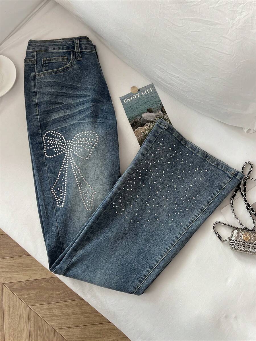 Flirla Women's Pocket Button Rhinestone Bow Design Casual Versatile Flare Leg Jeans - Light Wash - View 1