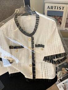 GlowEve Fashionable New Summer Elegant Short Sleeve Round Neck With Metal Button Decor, Ruffle Hem Contrast Color Splice Women Short Blouse - White - View 1