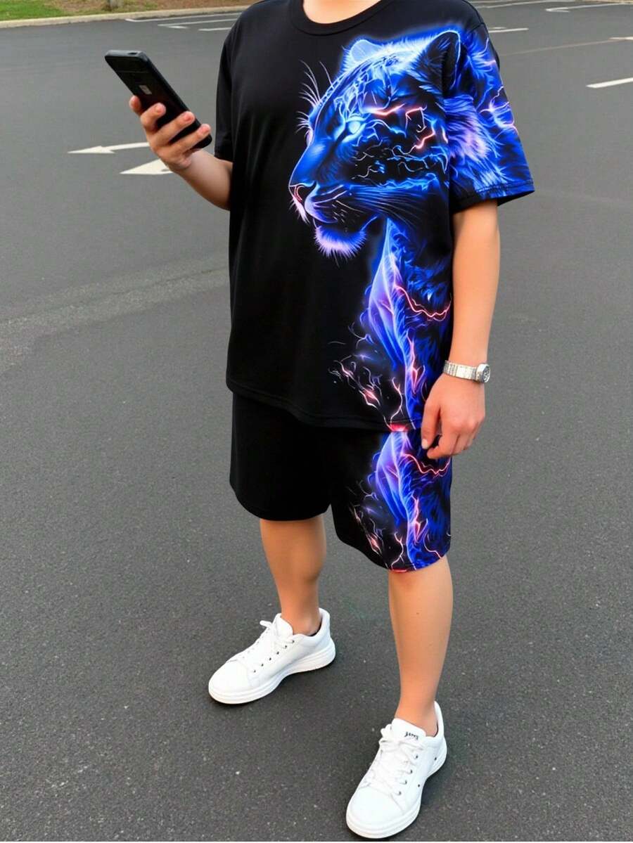 SHEIN 2件套青少年男童休闲夜视荧光动物图案短袖圆领套装，适合夏季穿着。2件套青少年男童短裤套装，男童夏季套装，男童图案T恤和短裤套装，男童套装，适合春夏季节日常穿着、运动、郊游、上学、聚会、节日、拍照等场合。