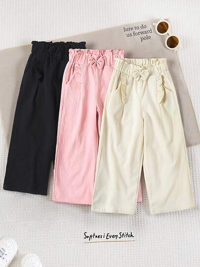 Genkimix Kids Set de 3 pantalones para niñas pequeñas, con diseños de lazos 3D y volantes, talla grande lindos para salidas. Combinación de colores multicolor: Negro/Albaricoque/Rosa, pantalones negros versátiles, pantalones de moda en color albaricoque y rosa, estilo de pierna recta, tela cómoda para primavera/verano