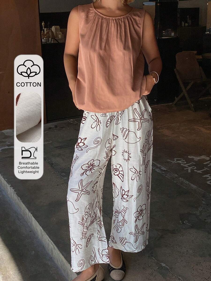 DAZY Bộ đồ ngủ nữ phong cách nghỉ hè gồm áo không tay dáng rộng cổ xếp ly và quần pajama in họa tiết đại dương. - Màu Hồng San hô - Xem 1