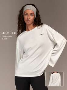 Fluxe T-shirt ample à manches longues et col rond pour femmes, blanc. Parfait pour le port casual, un Top de tous les jours , le sport en salle, l'entraînement ample, les vacances, l'été, le printemps, la Saint-Valentin, les sorties, les vacances, le casual - Blanc - Voir 1