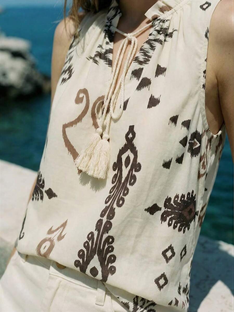 Lumivelle 女士时尚度假休闲流苏系带V领无袖宽松印花衬衫,春夏希腊度假波西米亚风上衣 - 杏色 - 查看 1