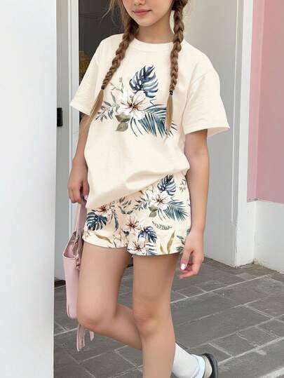 两件套少女休闲热带花卉印花短袖圆领T恤和短裤套装，适合春夏日常、居家、上学穿着，复古花卉图案，春夏时尚，休闲别致，轻松休闲风，轻盈舒适。
