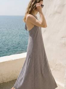 Lumivelle 女士春夏新款吊带系带条纹超大喇叭休闲度假浪漫露背连衣裙 - 黑與白 - 查看 4