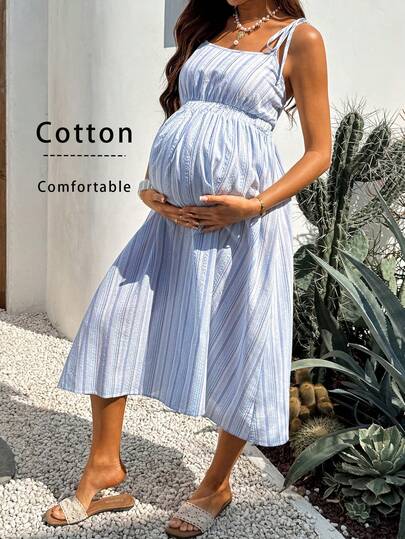 Boho Mama Summer Outfits Blue Striped Bohemian-Style Dresses  In Cotton, Perfect For Maternity Vacations. Features Include Drawstring Shoulder Straps, A Comfortable, Non-Restrictive Waistband, And Breathable, Sweat-Wicking Cotton Fabric. Maternity Summer Casual Striped Tie Shoulder Dress