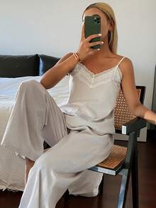 DAZY Bộ đồ ngủ 2 món gồm áo hai dây không tay phối ren và quần dài ống rộng dáng suông dành cho nữ, thích hợp cho mùa hè. - Màu Xám nhạt - Xem 5