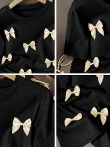 Resyla 女士休闲H型圆领3D蝴蝶结短袖粉色T恤，夏季可爱女式衬衫，优雅女式上衣，蝴蝶结装饰衬衫，女士蝴蝶结上衣，黑色蝴蝶结T恤，可爱黑色上衣，黑色蝴蝶结上衣，优雅蝴蝶结衬衫，女士上衣和衬衫，女式衬衫，女士上衣，女士服装 - 黑色 - 查看 3